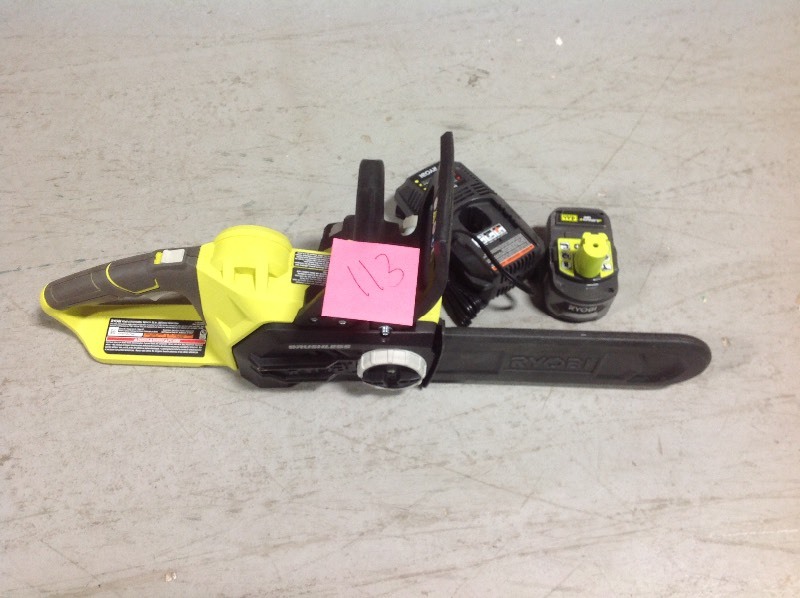 lot 113 image: RYOBI ONE 12 in. 18-Volt Brushless Lithium-Ion Electric Cordless Chainsaw - 4.0 Ah Battery and Charger Included in good conditions