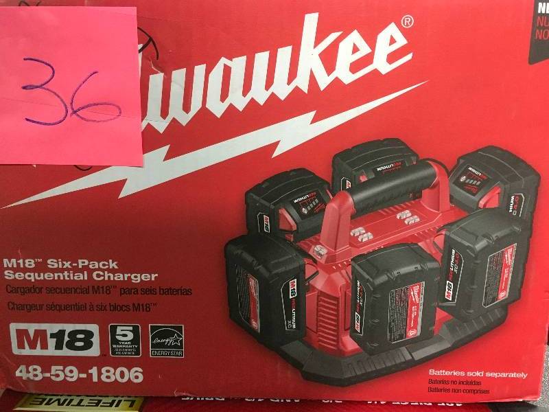 lot 36 image: Milwaukee M18 18-Volt Lithium-Ion 6-Port Sequential Battery Charger  in good working condition
