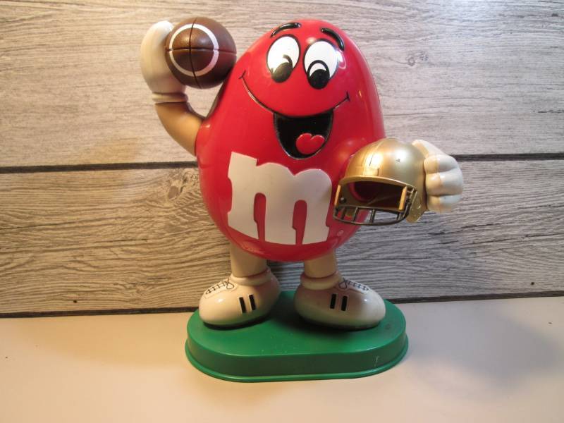 lot 25 image: M&Ms Dispenser 9 12 Tall  RMT...