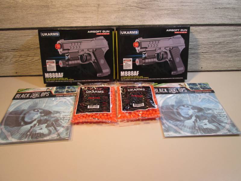 lot 94 image: 2 Airsoft Guns, 2 Packs of Airsoft ...