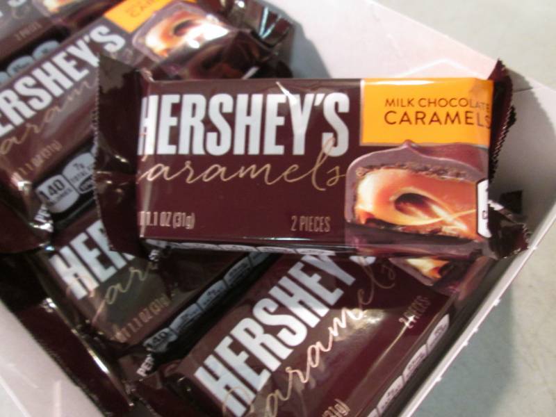 lot 132 image: Box of 12 Hersheys Caramels Best by...