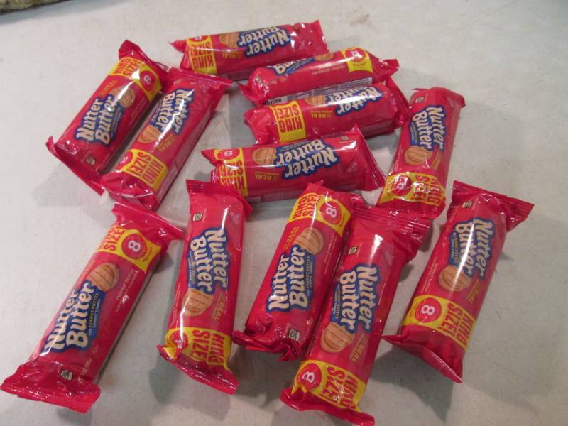lot 157 image: 12 King Size Packs of Nutter Butter...