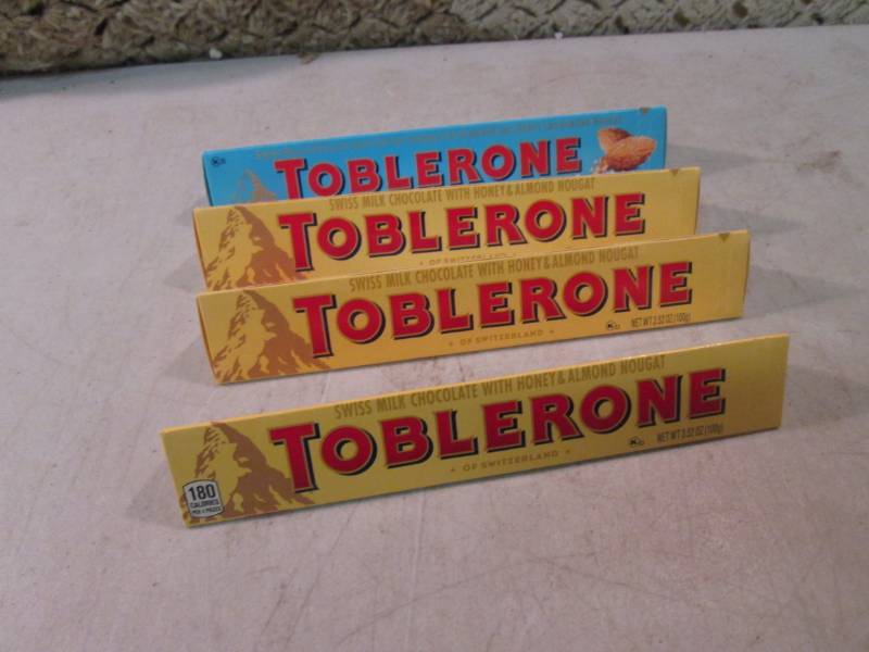 lot 198 image: 4 Toblerone Candy Bars Best by Feb ...