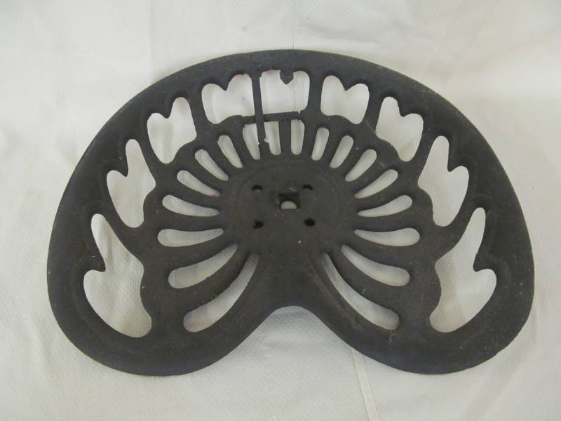 lot 37 image: vintage cast iron tractor seat