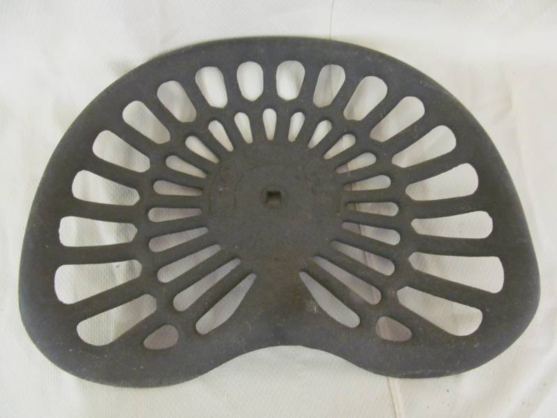 lot 39 image: vintage cast iron tractor seat