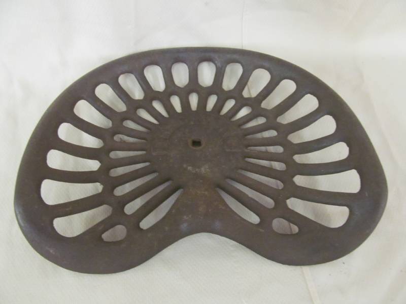 lot 40 image: vintage cast iron tractor seat
