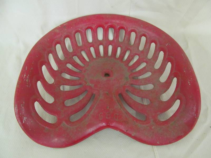 lot 41 image: vintage cast iron tractor seat