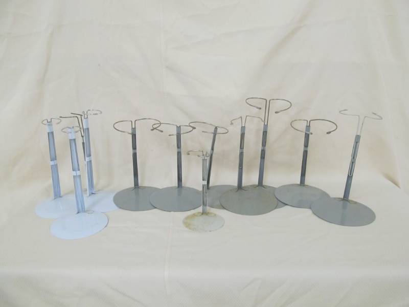 lot 59 image: porcelain doll stands