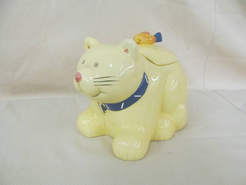 lot 102 image: Coco Dowley cookie Jar