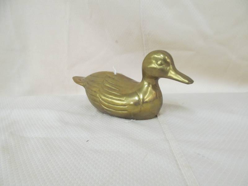 lot 141 image: brass duck
