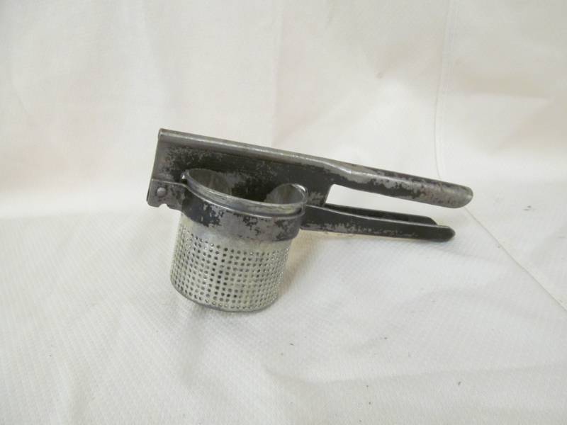 lot 149 image: potato ricer