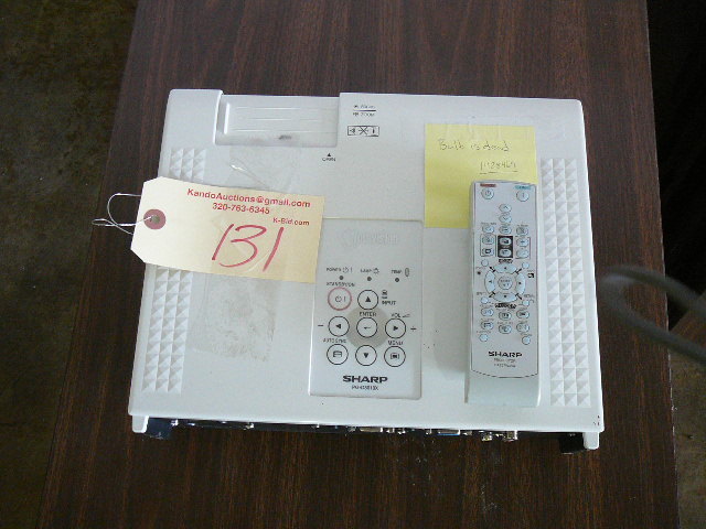 lot 131 image: Sharp DLP 3D Ready Texas Instruments Projector With Remote