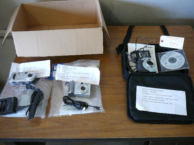 lot 55 image: Lot of Digital Cameras With Accessories