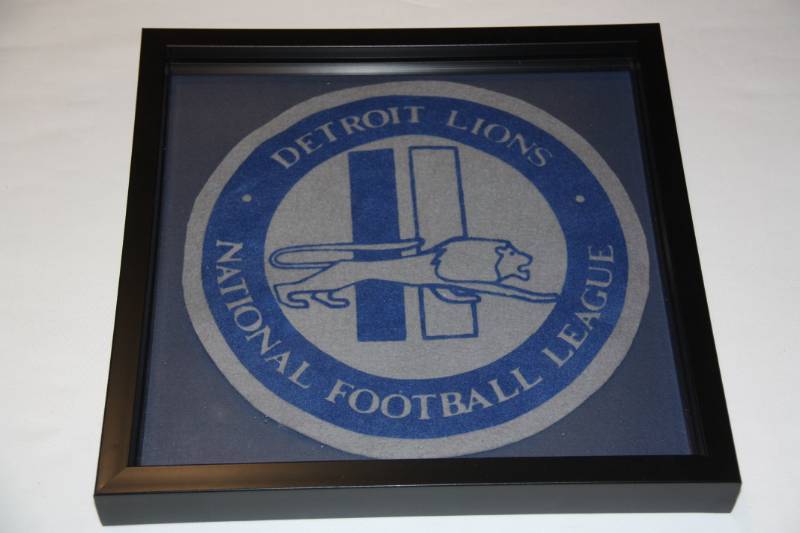 lot 66 image: Framed Vintage Detroit Lions Patch