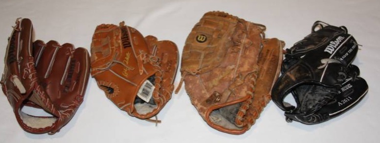 lot 129 image: Kirby Puckett Signature Series Baseball Glove  4 Items