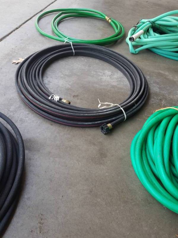 lot 70 image: Collection of Garden Hoses and Lawn Sprayer (10)