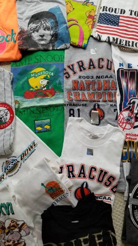 lot 59 image: Vintage Sporting Event & Concert T-Shirts & Baseball Caps
