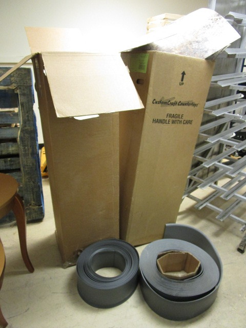 lot 112 image: COUNTERTOP SURFACING MATERIAL AND RUBBER WALL PROTECTOR