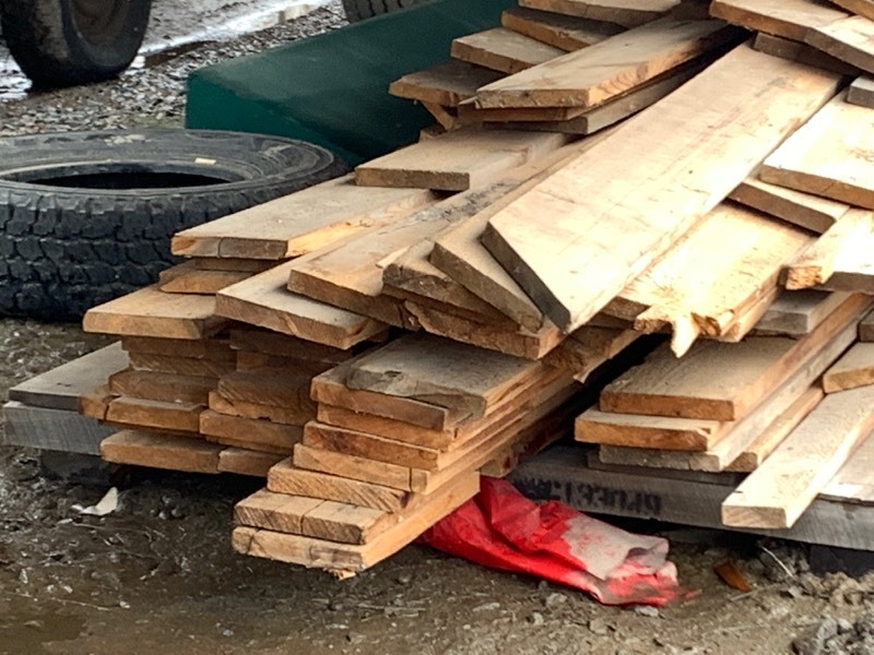 lot 7B image: Pallet Of Assorted Size Rough-Cut Cedar Lumber