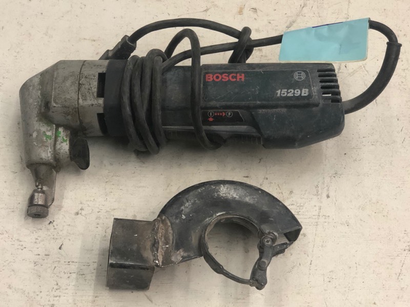 lot 31 image: Bosch Nibbler Punch Tool