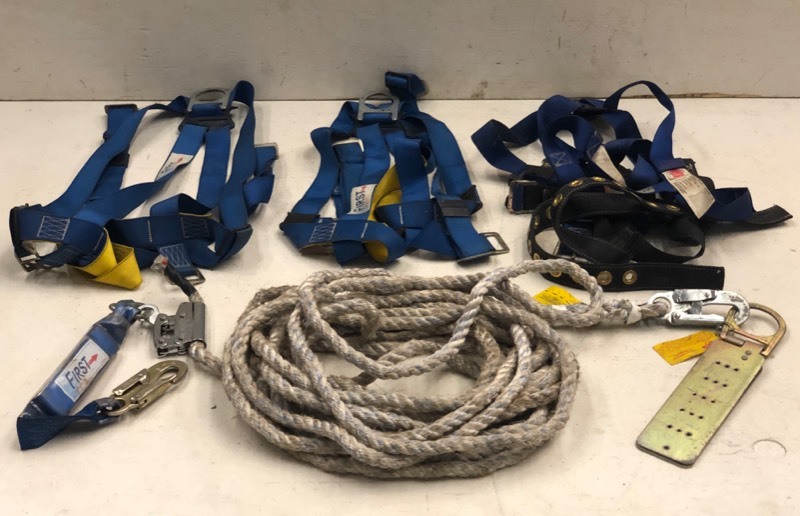 lot 18 image: Bucket Of Assorted Commercial Safety Harness