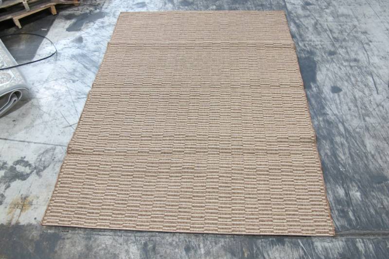 lot 1 image: Studio by Brown Jordan Huntington ChestnutGrain Rug 53 x 75 IndoorOutdoor Area Rug