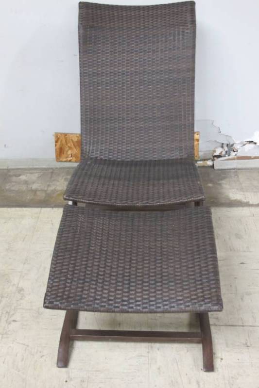 lot 10 image: Brown Woven Wicker Outdoor Lounge Chair with matching Footrest