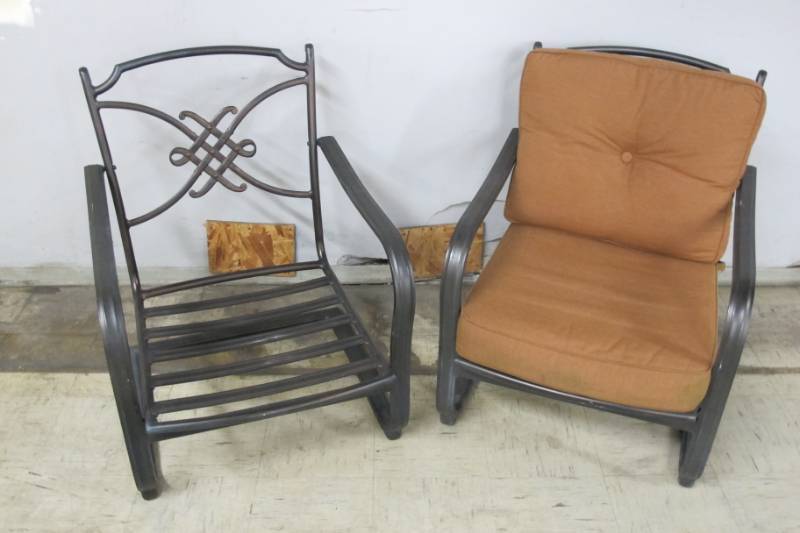 lot 9 image: Pair of Brown Metallic Outdoor Chairs with Removable Orange Cushions