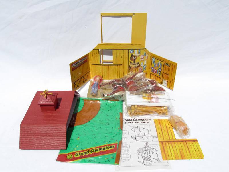 lot 6 image: Case of New Vintage Marchon Grand Champion Horse Stable and Corral Playsets