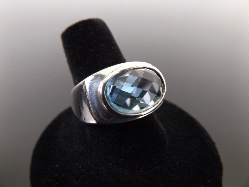 lot 4 image: .925 Sterling Silver Faceted Topaz Ring Size 8.75