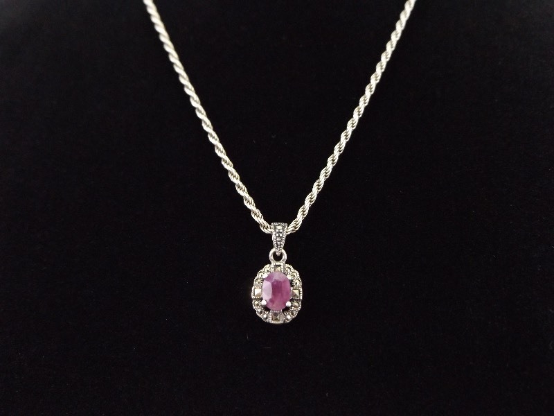 lot 12 image: .925 Sterling Silver Art Nouveau Faceted Ruby Pendant Necklace