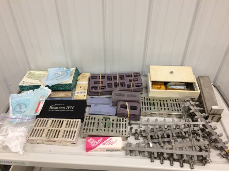 lot 10 image: Miscellaneous Dental Xray Parts Plus A Box Of Cool Dental Teeth  