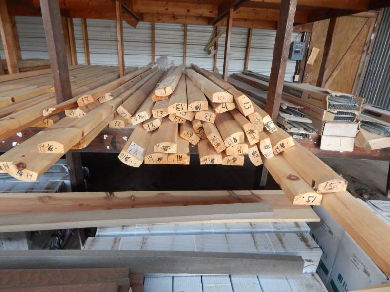 lot 303 image: 4 hand hewn log trim