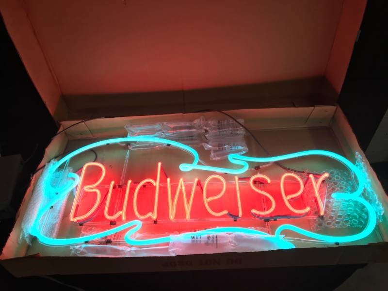 lot 48 image: Budweiser neon mounted on glass frame
