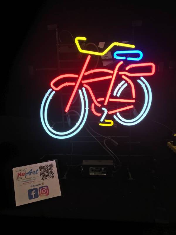 lot 76 image: Fat Tire neon bike