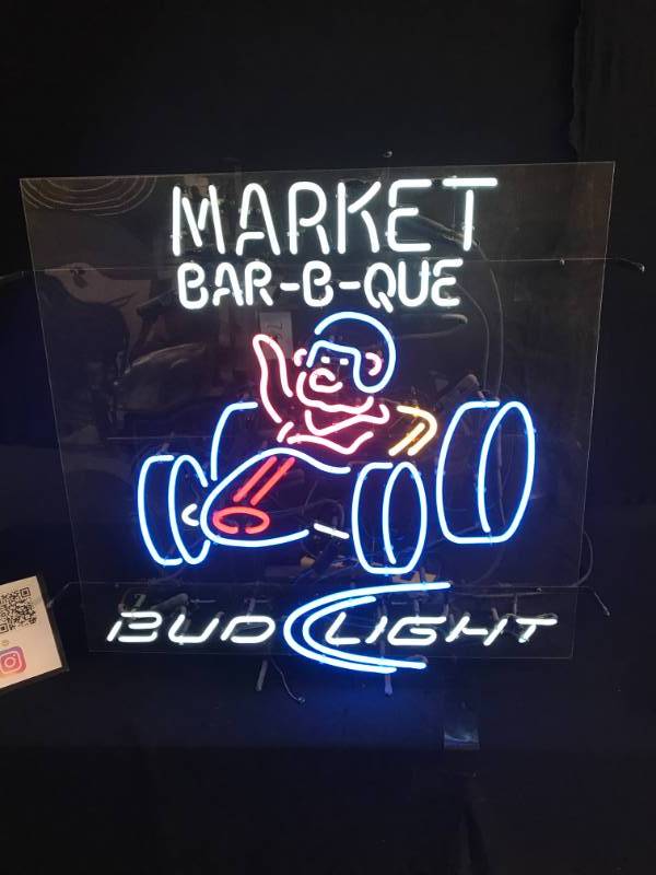 lot 78 image: Bud Light with racing pig neon