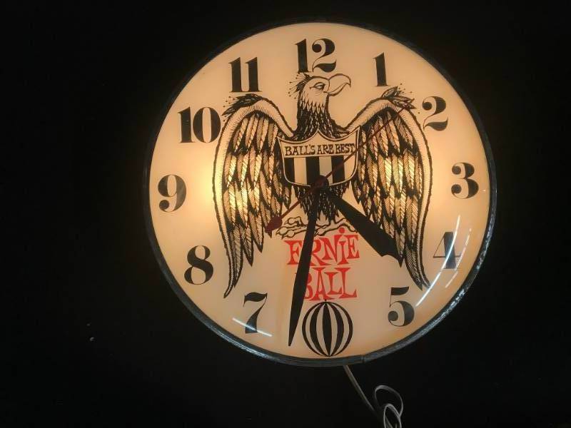 lot 83 image: Ernie Ball clock