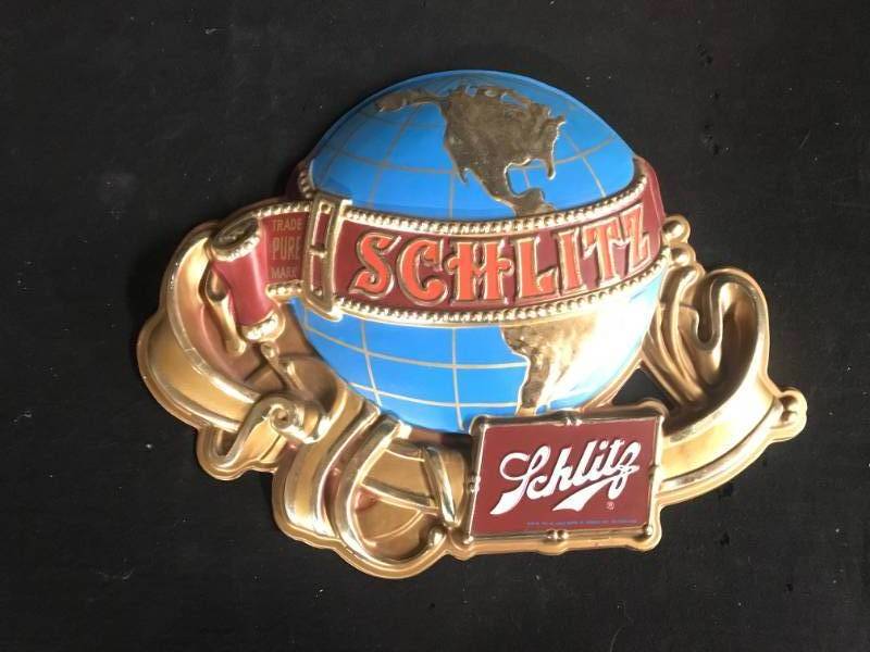 lot 94 image: Schlitz Beer Globe vacuum formed plastic