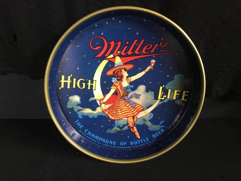 lot 99 image: Miller High Life, Lady in the Moon 12 serving tray