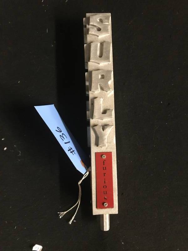 lot 136 image: Surly cast aluminum tapper with with extra plates