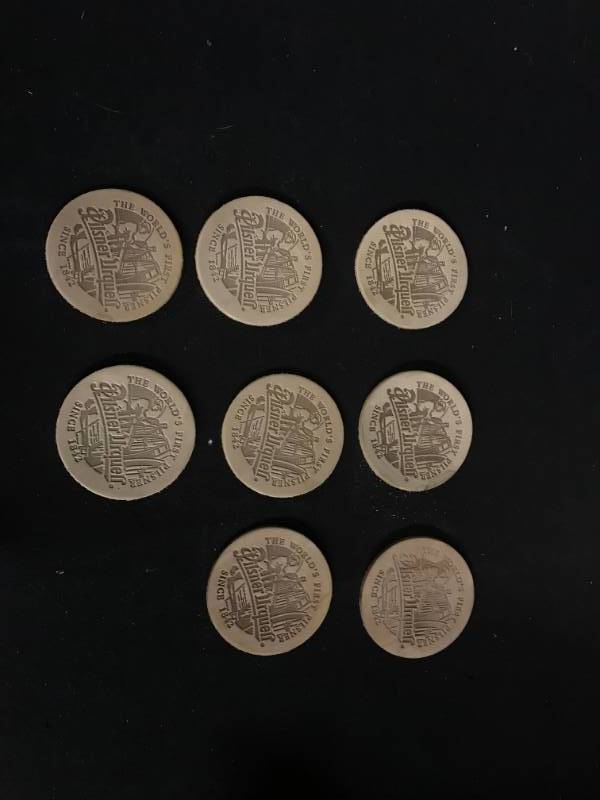 lot 167 image: Pilsner Urquell embossed leather coasters