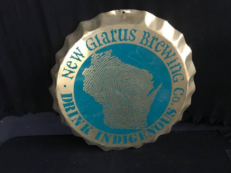 lot 174 image: New Glarus Brewing tin bottlecap