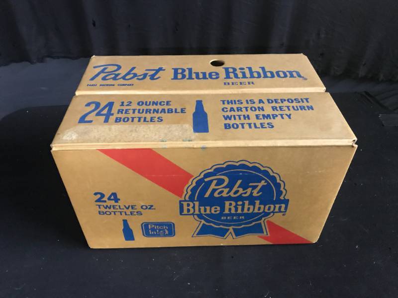 lot 183 image: PBR Pabst Blue Ribbon Beer cardboard case and coasters