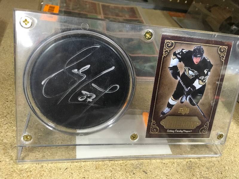 lot 5 image: Autographed Sidney Crosby Puck W Card