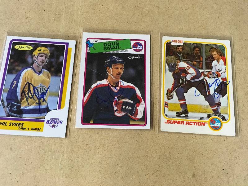 lot 53 image: Three Former UND Autographed Cards
