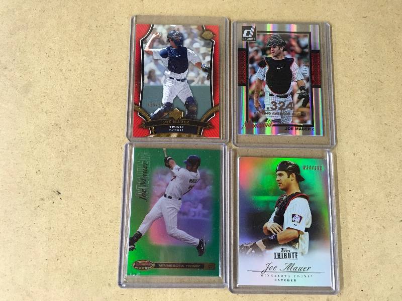 lot 56 image: Four Numbered Joe Mauer Cards