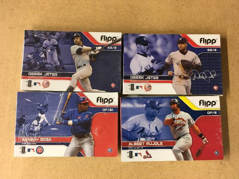 lot 88 image: Four MLB Flipps Books - Jeter