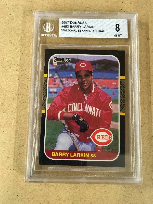 lot 100 image: 1987 Donruss Barry Larkin 8 Mint Rookie Card - Hall of Famer