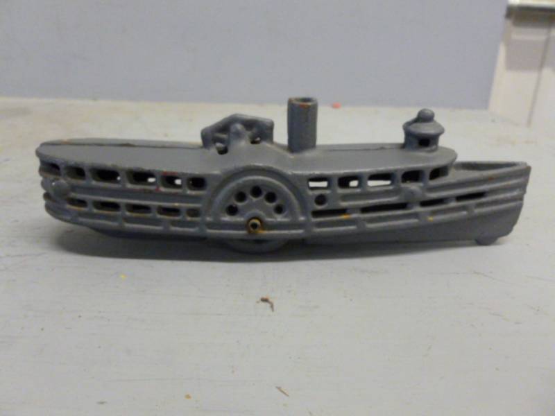 lot 149 image: Cast Iron Boat