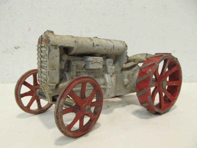 lot 14 image: Old Vintage Cast Iron FORDSON Toy Tractor